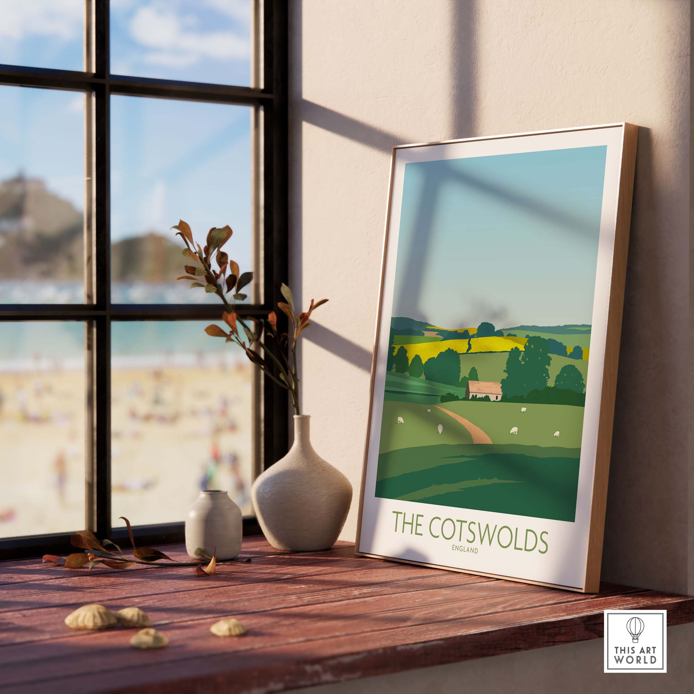 Stylish Cotswolds print travel poster framed by a window, showcasing England's scenic countryside.