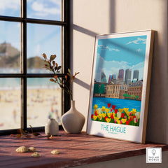 The Hague Netherlands poster featuring a minimalist design with tulips and a cityscape, displayed indoors.