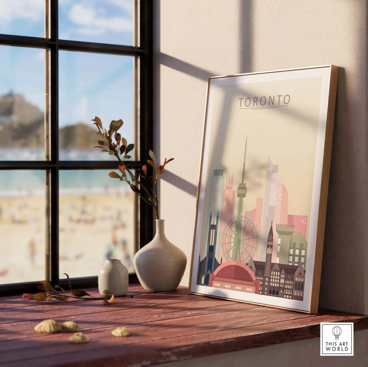 Framed Toronto Skyline print displayed indoors, showcasing iconic buildings in soft pastel colors.
