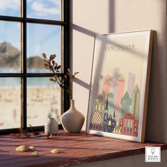 Vancouver City Print wall art showcasing iconic architecture in warm pastel tones, framed on a beach view table.