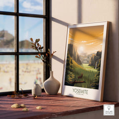 Yosemite National Park minimalist poster displayed on a wooden table with sunlight streaming through a window.