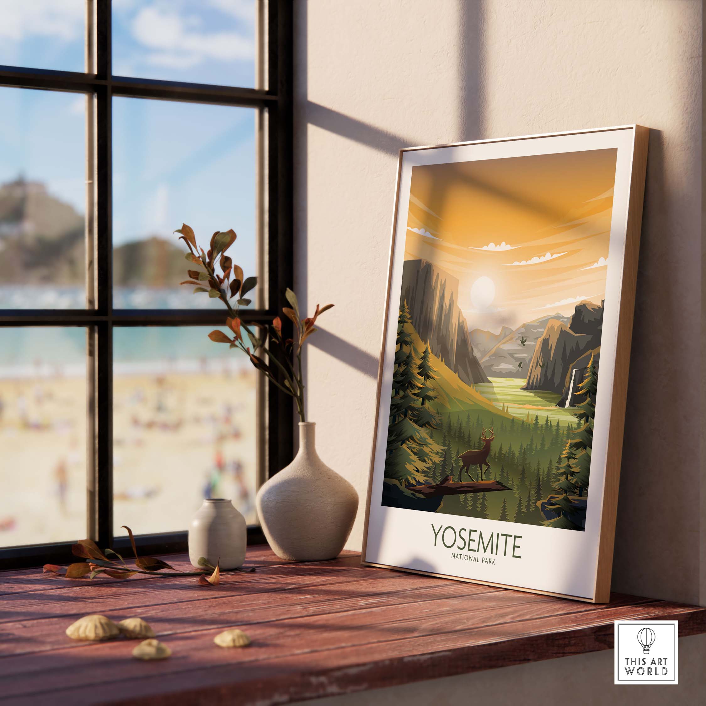Yosemite National Park minimalist poster displayed on a wooden table with sunlight streaming through a window.