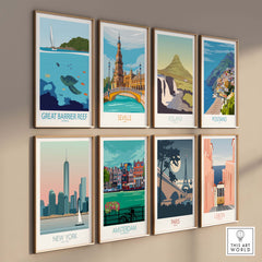 Colorful wall art featuring Great Barrier Reef, Seville, Iceland, Positano, New York, Amsterdam, Paris, and Lisbon posters.