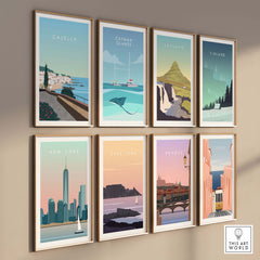 Framed travel posters featuring Calella, Catana Islands, Iceland, Finland, New York, Cape Town, Prague, and Lisbon.