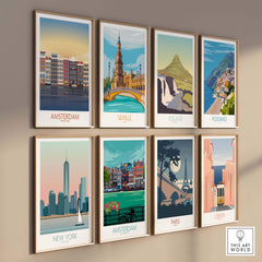 A collection of vintage-inspired travel posters featuring cities like Amsterdam, Seville, and New York, displayed on a stylish wall.