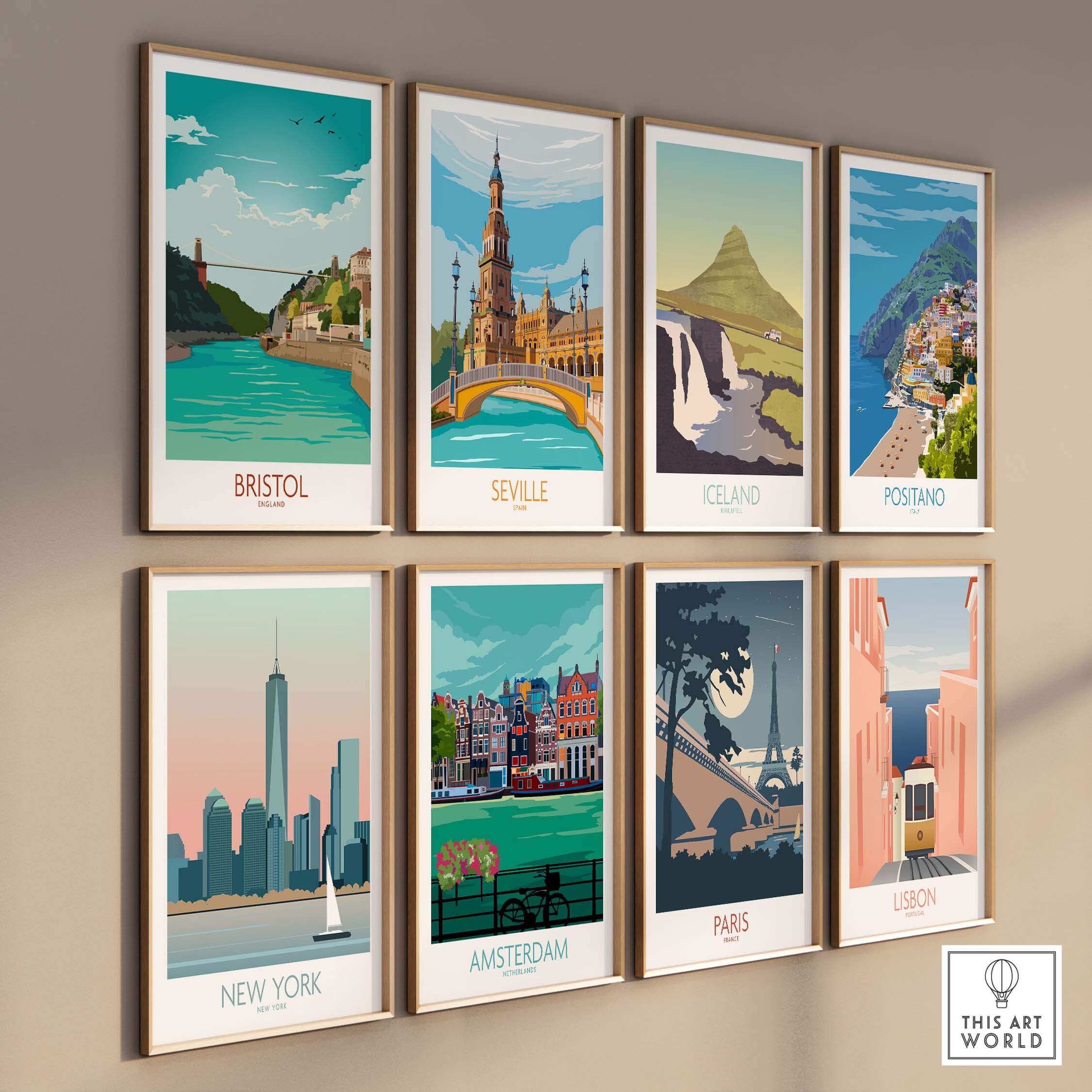 Vintage travel posters of Bristol, Seville, Iceland, Positano, New York, Amsterdam, Paris, and Lisbon on a gallery wall.
