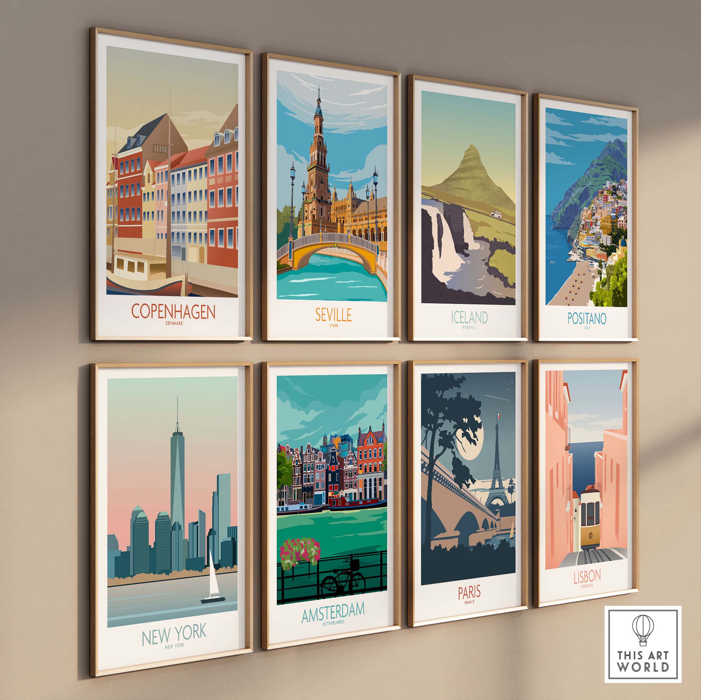 Vintage travel wall art prints featuring cities like Copenhagen, Seville, Iceland, and Paris in stylish frames.