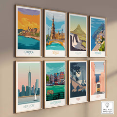 Vintage travel posters collection featuring destinations like Corsica, Seville, and Paris in stylish frames.
