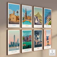 Collection of vintage travel poster prints featuring Cyprus, Seville, Iceland, Positano, New York, Amsterdam, Paris, and Lisbon.