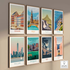 Gallery of travel poster art prints featuring Denmark, Seville, Iceland, Positano, New York, Amsterdam, Paris, and Lisbon.