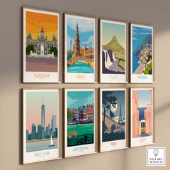 Gallery of vibrant travel poster art prints featuring Glasgow, Seville, Iceland, Positano, New York, Amsterdam, Paris, and Lisbon.