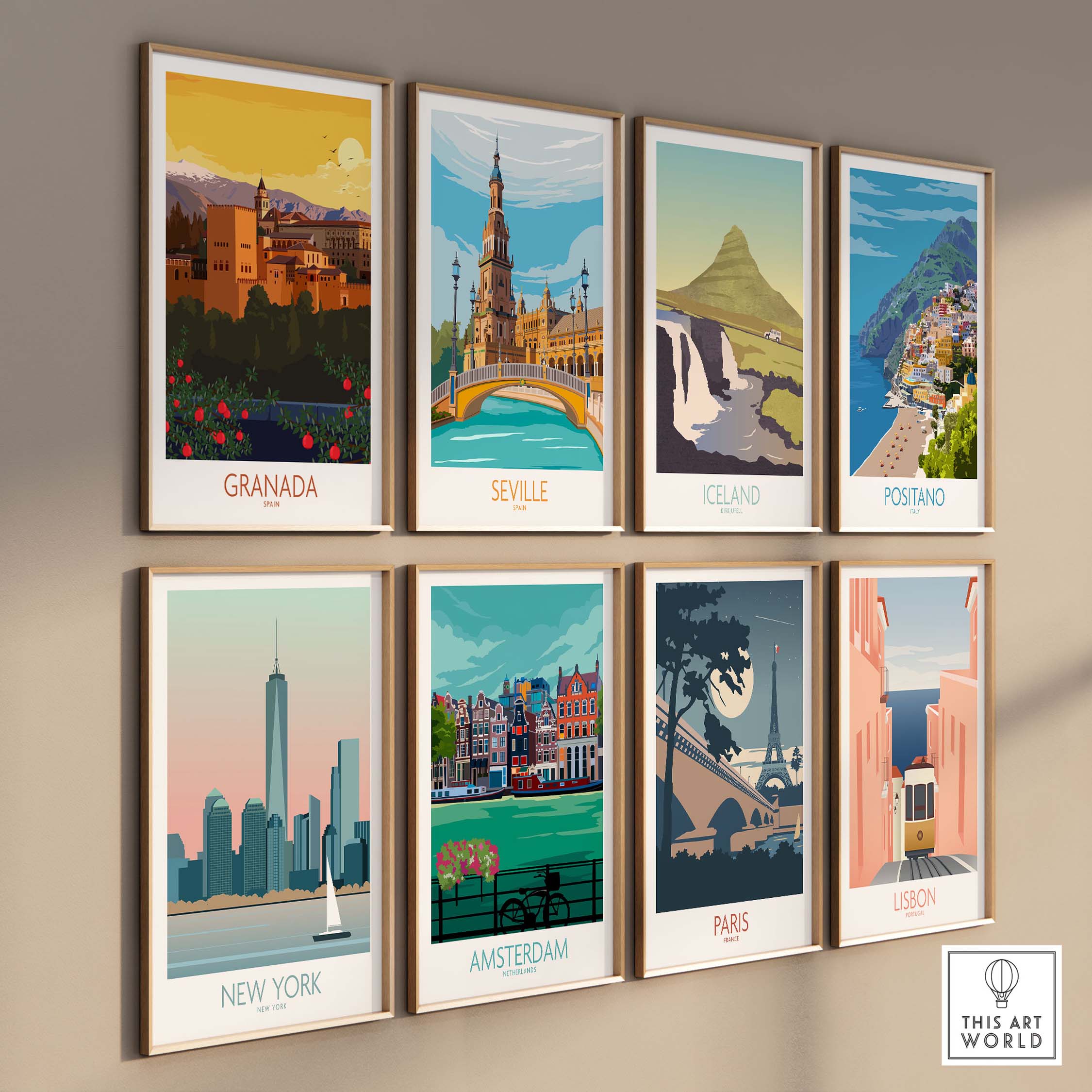 Gallery wall of vintage-inspired travel posters featuring Granada, Seville, Iceland, Positano, New York, Amsterdam, Paris, and Lisbon.