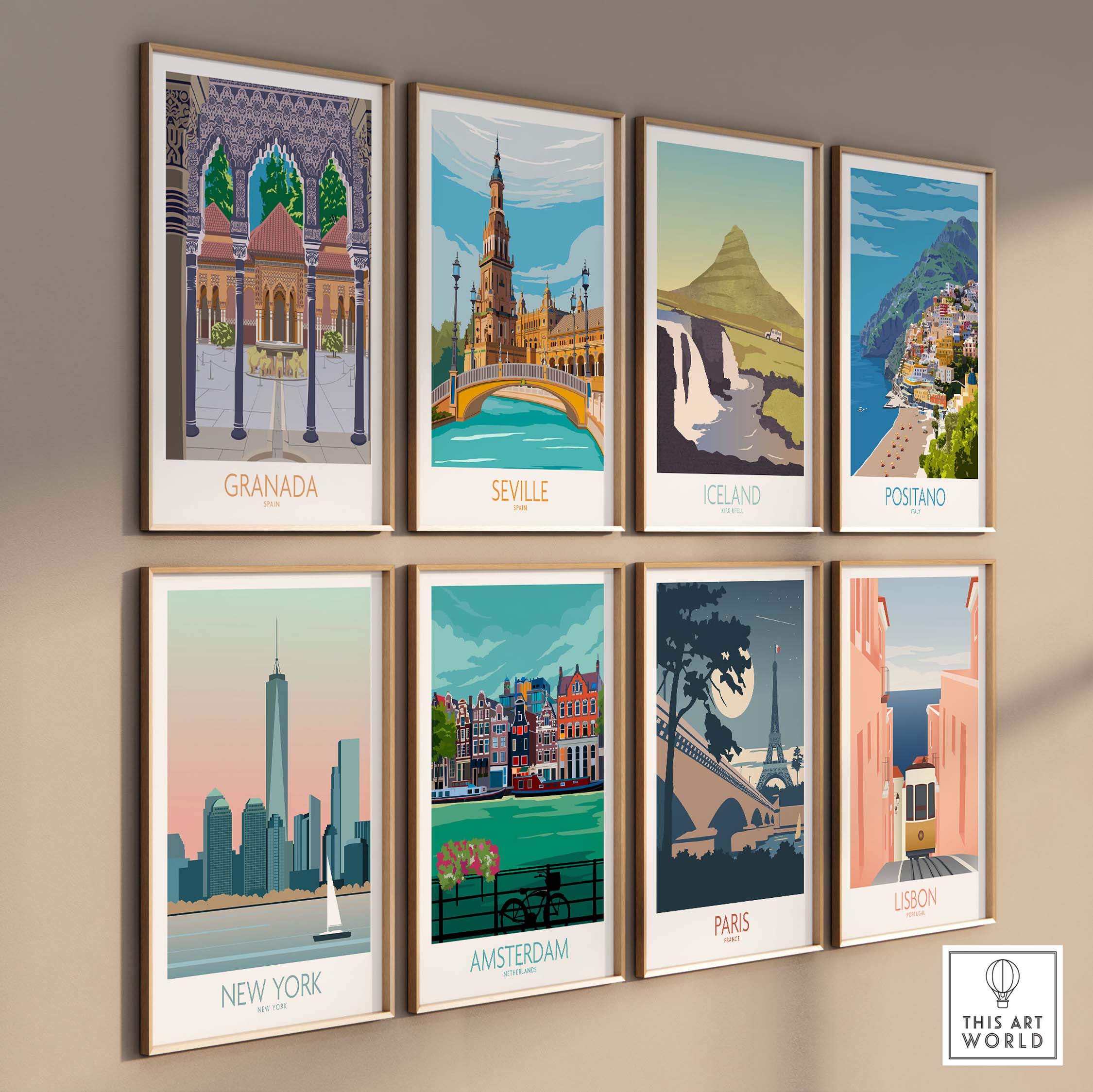Collection of vintage travel poster prints including Granada, Seville, Iceland, Positano, New York, Amsterdam, Paris, and Lisbon.
