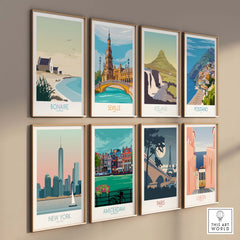 Colorful travel wall art prints featuring Bonaire, Seville, Iceland, Positano, New York, Amsterdam, Paris, and Lisbon.
