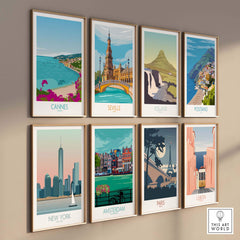 Gallery of travel prints featuring Cannes, Seville, Iceland, Positano, New York, Amsterdam, Paris, and Lisbon.