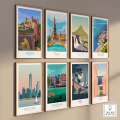 Gallery of travel posters including Toledo, Seville, Iceland, and Positano displayed on a wall.