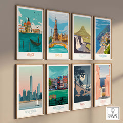 Collection of vintage travel posters including Venice, Seville, Iceland, and more, displayed in stylish frames.