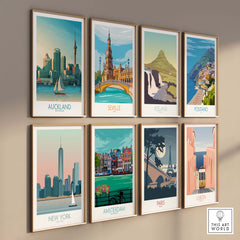 A collection of vintage-style travel posters featuring Auckland, Seville, Iceland, Positano, New York, Amsterdam, Paris, and Lisbon.