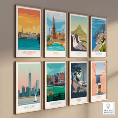 Collection of vintage travel posters featuring Maastricht, Seville, Iceland, and more on a wall.