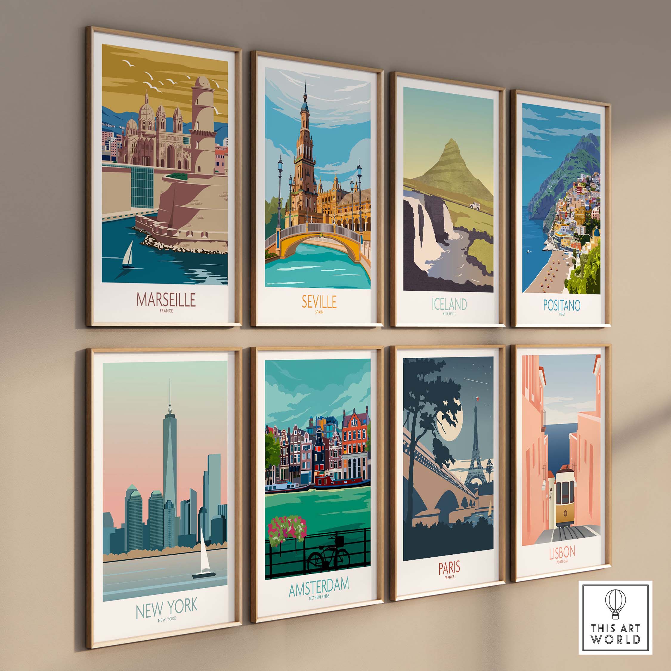 Collection of vintage travel posters including Marseille, Seville, and Paris in stylish frames on a wall.