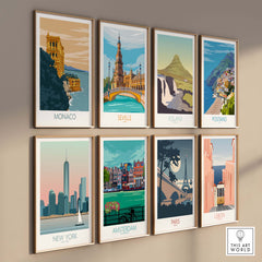 Collection of vintage travel posters featuring Monaco, Seville, Iceland, Positano, New York, Amsterdam, Paris, and Lisbon.