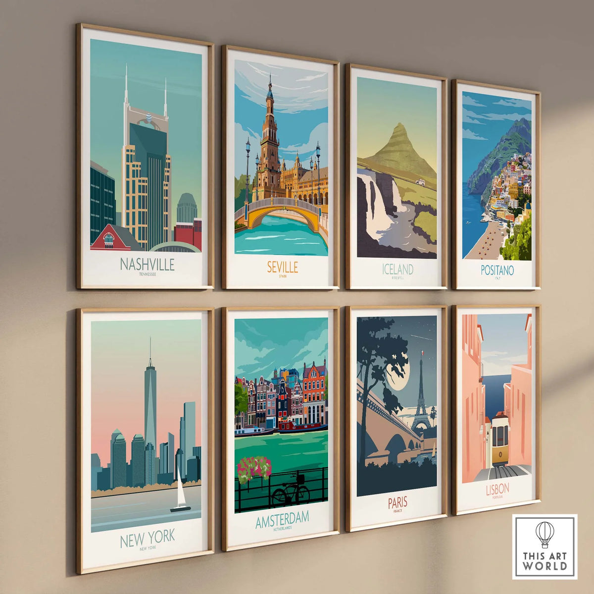 Collection of vibrant travel posters including Nashville, Seville, Iceland, and more, framed on a stylish wall.