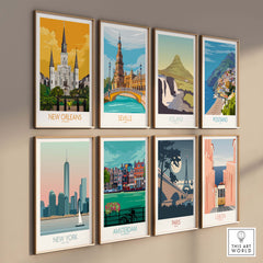 Collection of vintage travel posters featuring New Orleans, Seville, Iceland, Positano, New York, Amsterdam, Paris, and Lisbon.