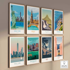 Collection of vintage travel posters featuring New York, Seville, Iceland, Positano, Amsterdam, Paris, and Lisbon.