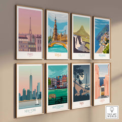 Collection of vintage travel posters featuring Paris, New York, Amsterdam, and more, styled in framed prints.