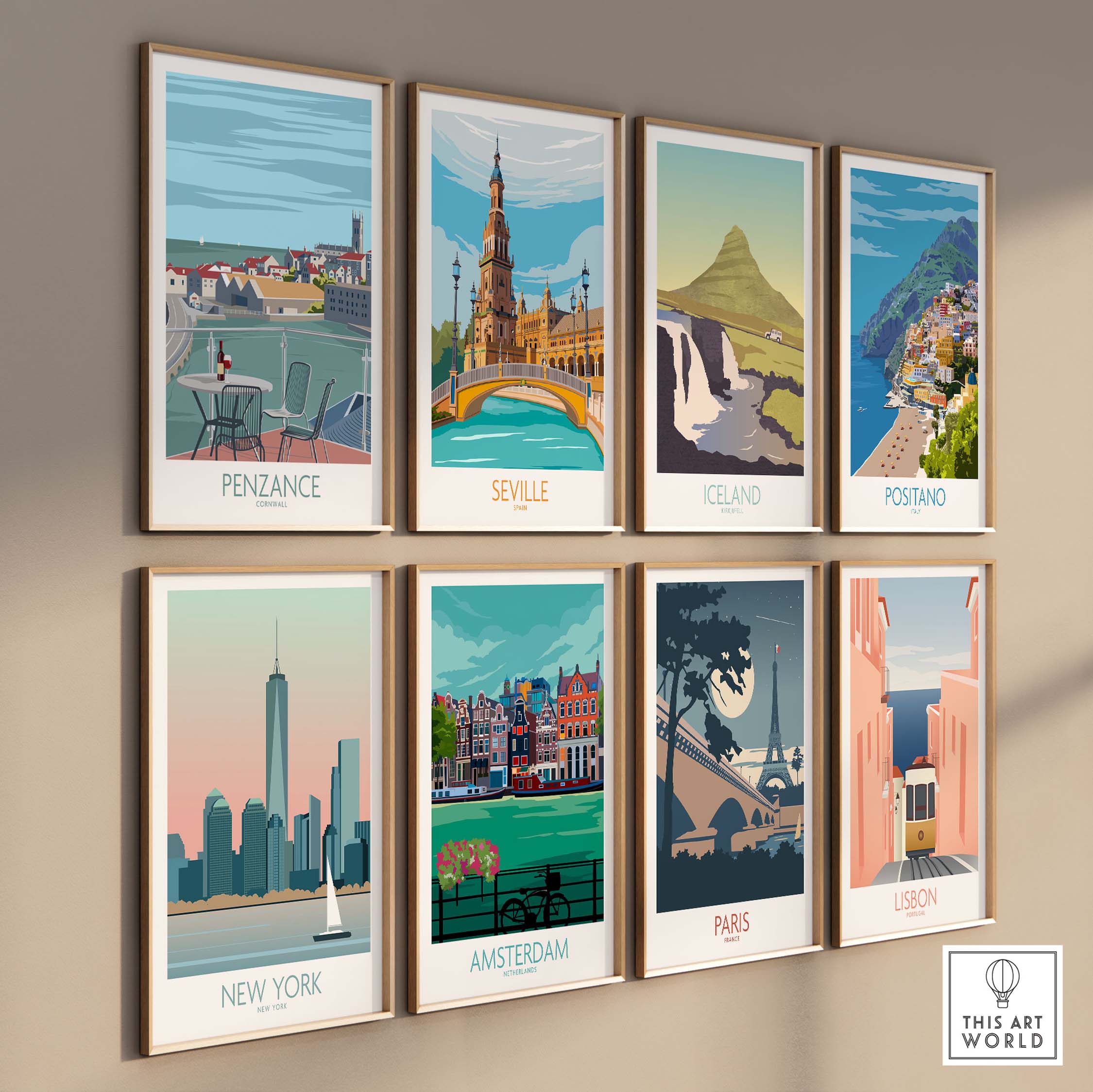 Collection of framed travel posters featuring Penzance, Seville, Iceland, Positano, New York, Amsterdam, Paris, and Lisbon.