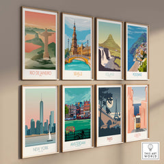 Collection of vintage travel posters featuring Rio de Janeiro, Seville, Iceland, Positano, New York, Amsterdam, Paris, and Lisbon.