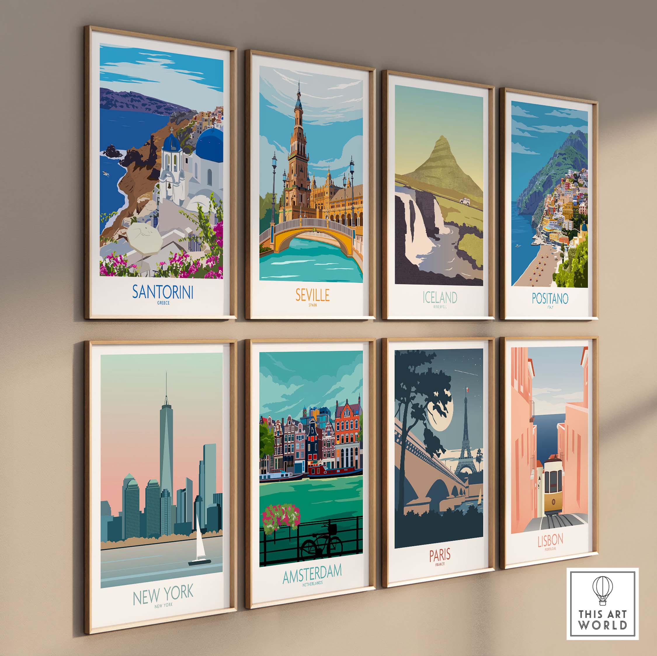 Collection of framed travel posters featuring Santorini, Seville, Iceland, Postano, New York, Amsterdam, Paris, and Lisbon.
