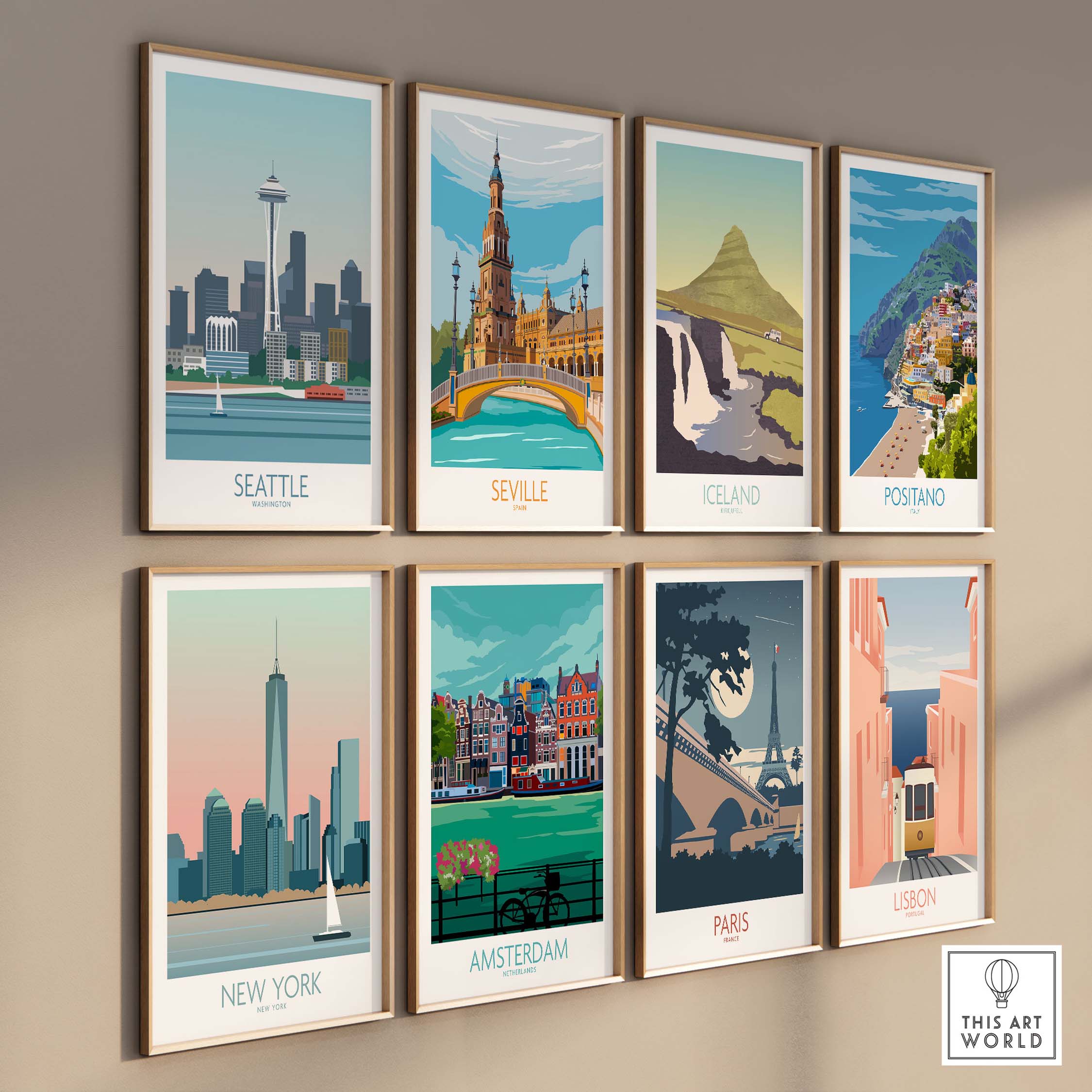 A collection of framed travel posters featuring Seattle, Seville, Iceland, Positano, New York, Amsterdam, Paris, and Lisbon.