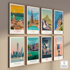 Gallery of travel art prints featuring St Tropez, Seville, Iceland, Positano, New York, Amsterdam, Paris, and Lisbon.