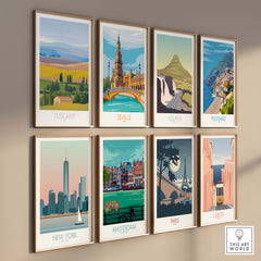 Collection of vintage-inspired travel art prints, featuring Tuscany, Seville, Iceland, and more, displayed on a stylish wall.