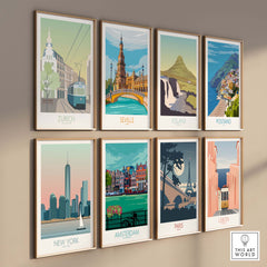 Collection of vintage travel posters featuring Zurich, Seville, Iceland, Positano, New York, Amsterdam, Paris, and Lisbon.
