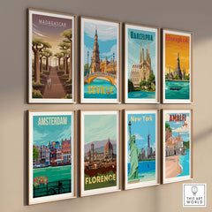 Collection of vintage travel posters featuring cities like Madagascar, Barcelona, and New York displayed in frames.