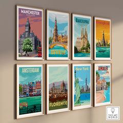 Nine vintage travel posters displayed on a wall, featuring cities like Manchester, Barcelona, and New York.