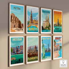 Collection of vintage travel poster prints featuring Petra, Barcelona, Seville, Bangkok, Amsterdam, Florence, New York, and Amalfi.