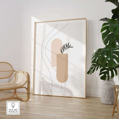 Palm Leaf Print abstract artwork in a modern room, framed with natural décor and greenery.
