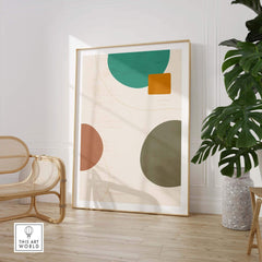 Abstract digital print featuring geometric shapes in green, brown, and orange within a modern interior design setting.