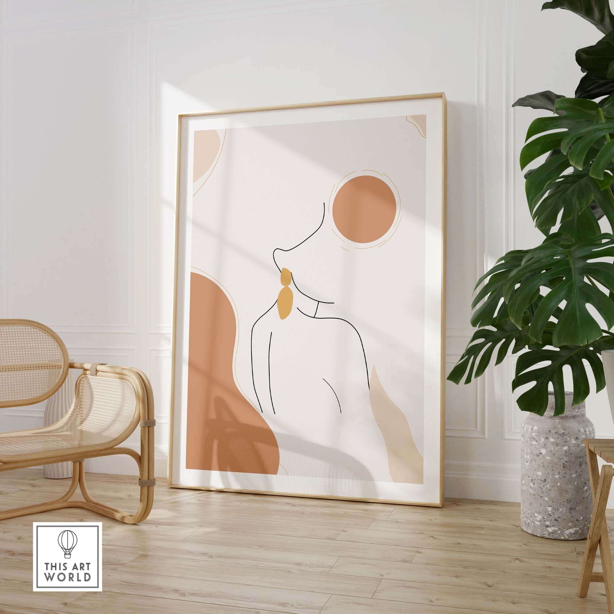 Abstract female outline print in a modern frame, adding stylish decor to a bright room with plants.