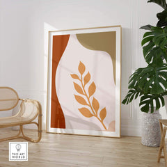 Abstract Leaf Wall Art framed in warm colors, enhancing modern interior decor with a contemporary boho touch.