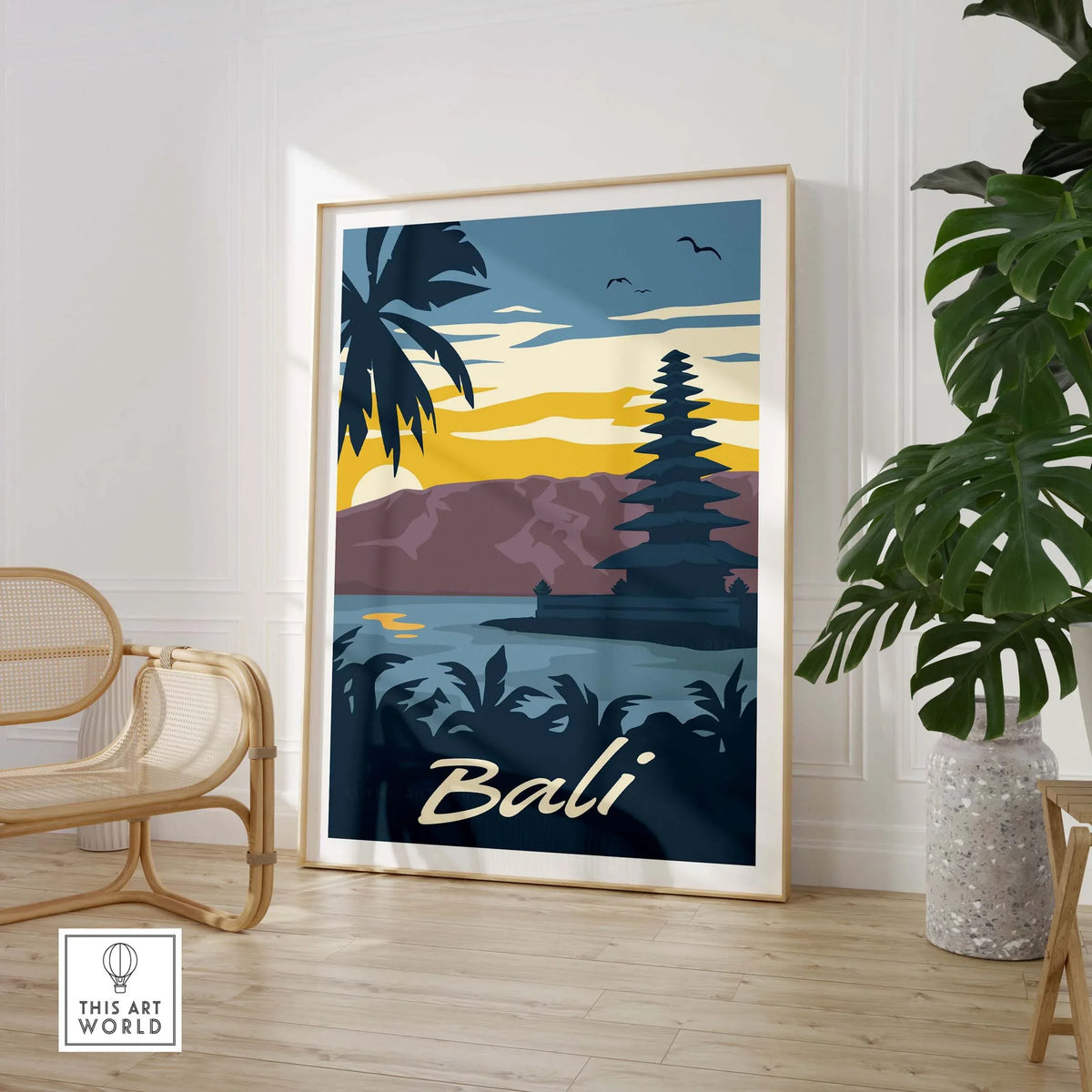 Bali poster wall art print showcasing a serene landscape with silhouettes and vibrant colors, framed in a stylish interior.