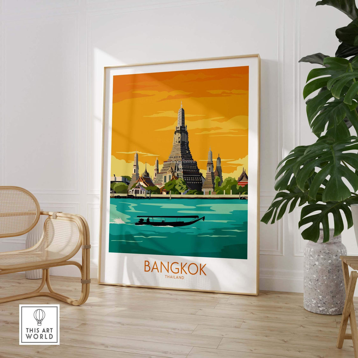 Bangkok travel poster featuring a vibrant illustration of Wat Arun and a boat on the Chao Phraya River, framed in a stylish interior.