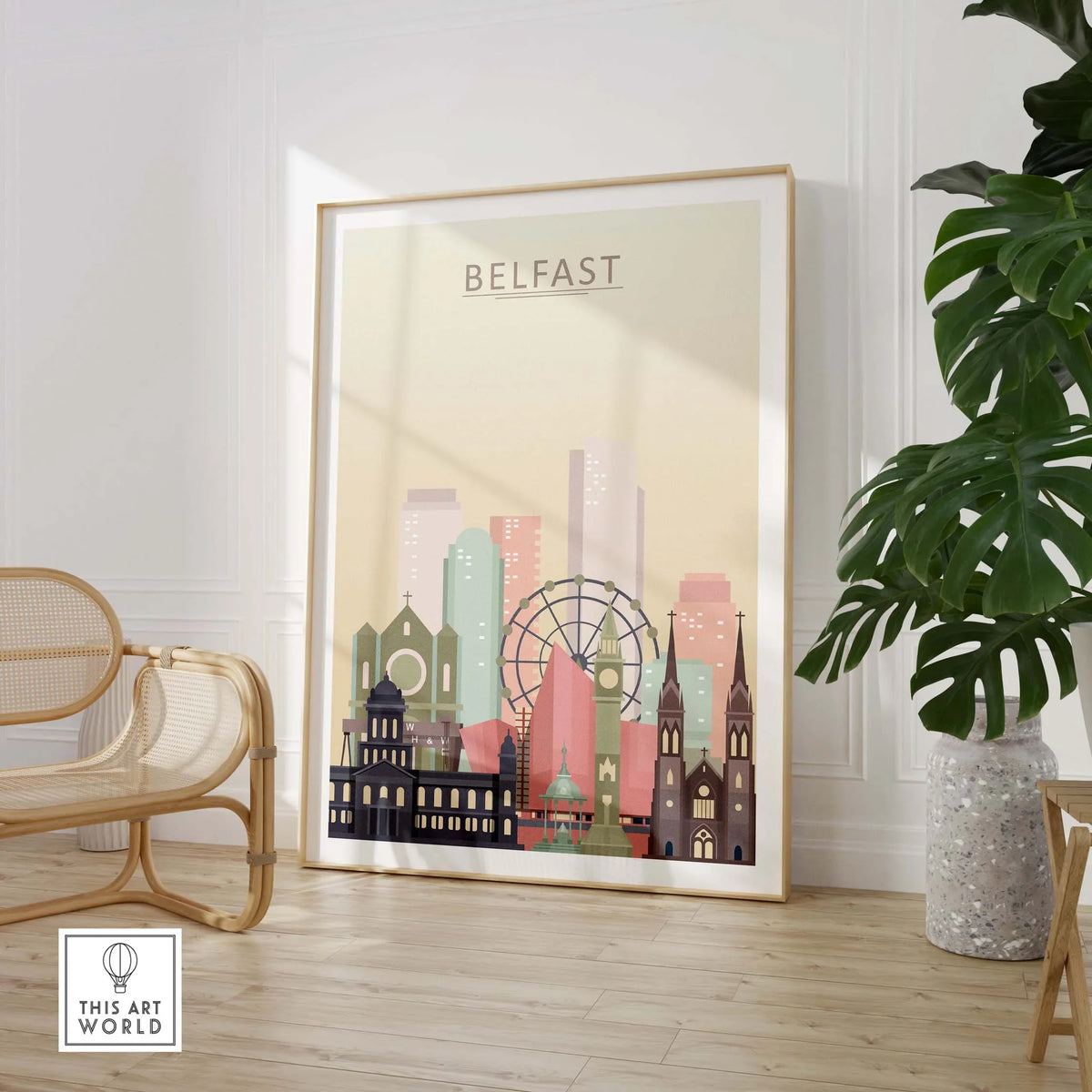 Belfast skyline print showcasing iconic buildings in warm pastel tones, framed artwork in modern interior design setting.