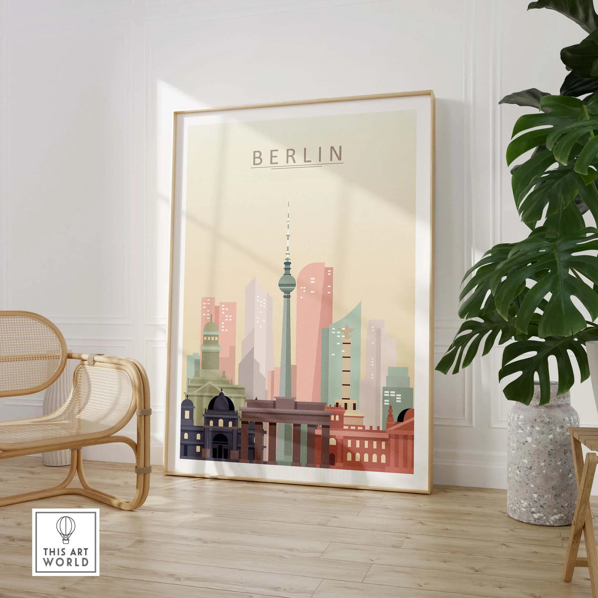 Colorful Berlin city skyline print in warm pastel tones, displayed in a modern room setting.