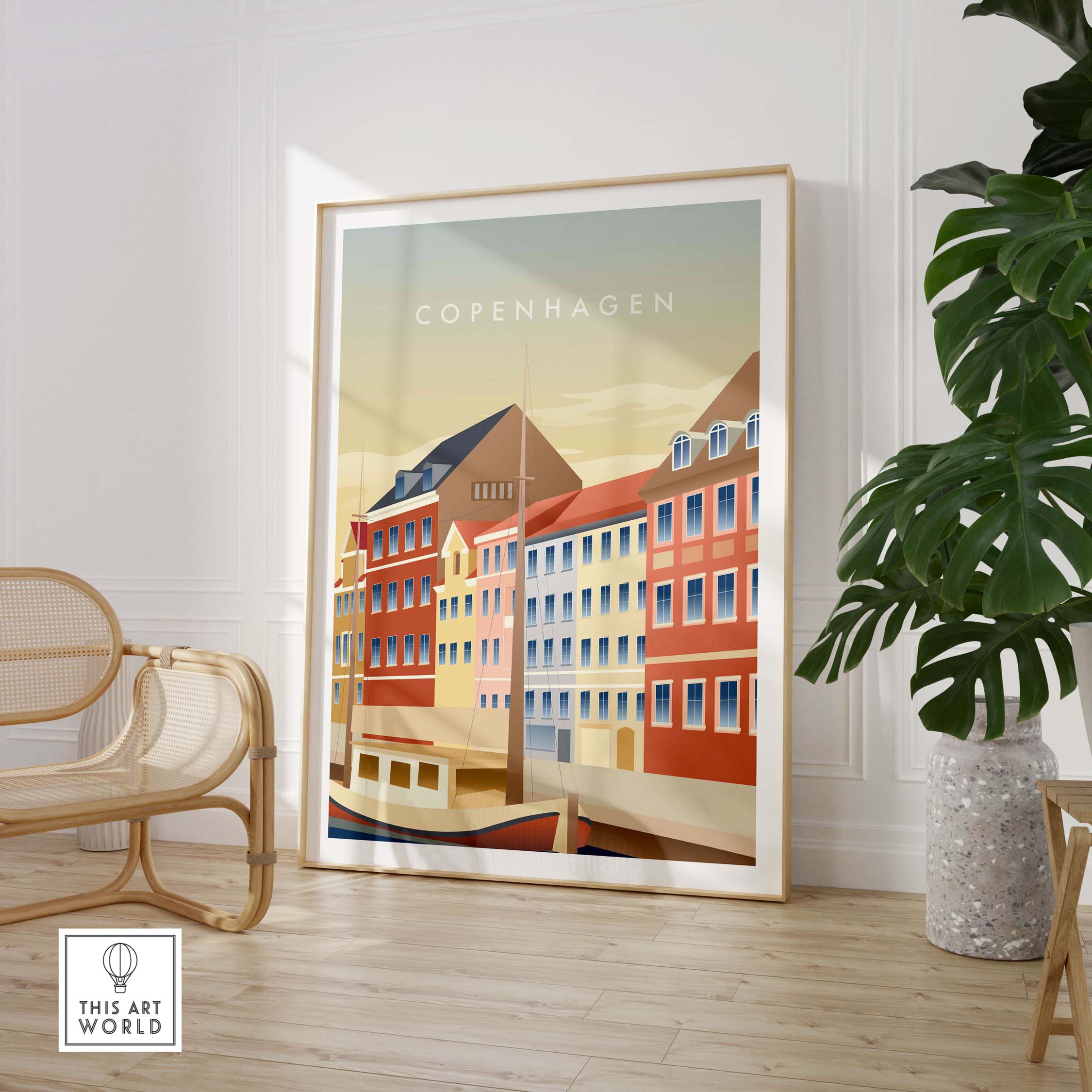 Copenhagen Wall Art Poster framed in a stylish home setting, featuring colorful buildings and a vintage travel vibe.
