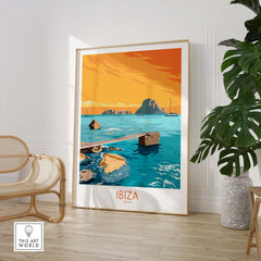 Ibiza Island vintage travel poster art with vibrant colors, featuring ocean and rocks in stylish interior setting.