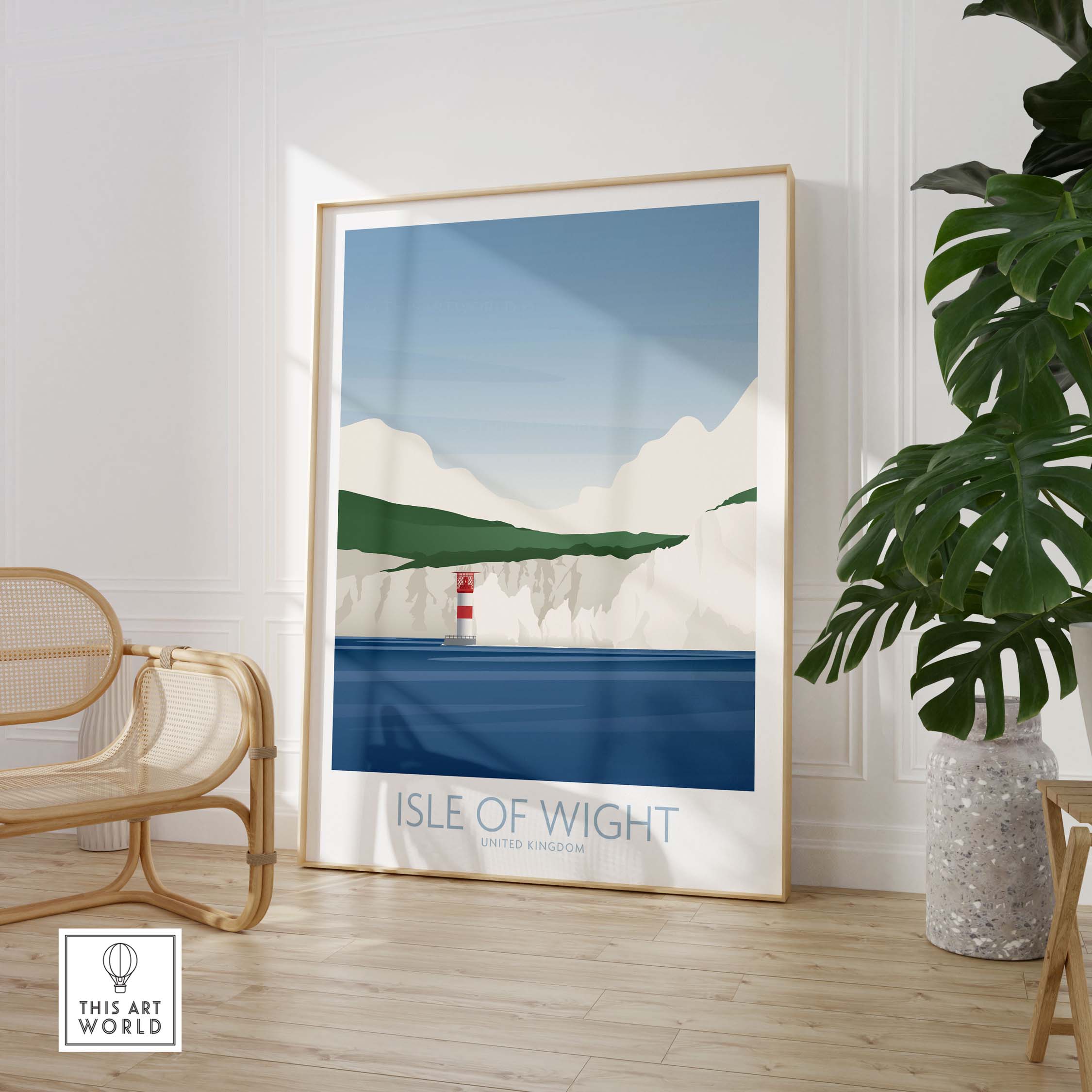 Isle of Wight vintage travel art print in stylish interior setting, showcasing coastal cliffs and lighthouse.